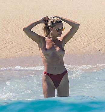Brooks Nader topless on the beach in Cabo San Lucas