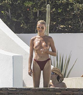 Brooks Nader topless on the beach in Cabo San Lucas