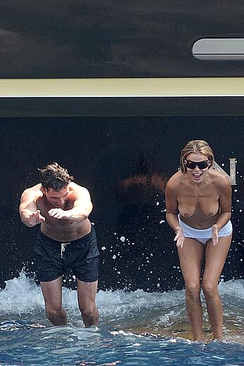 Brooks Nader topless on a yacht in Positano, Italy - August 27, 2026