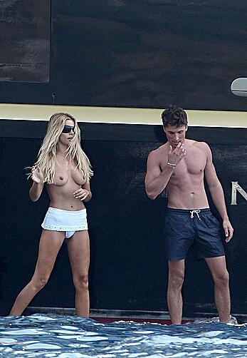 Brooks Nader topless on a yacht in Positano, Italy - August 27, 2026