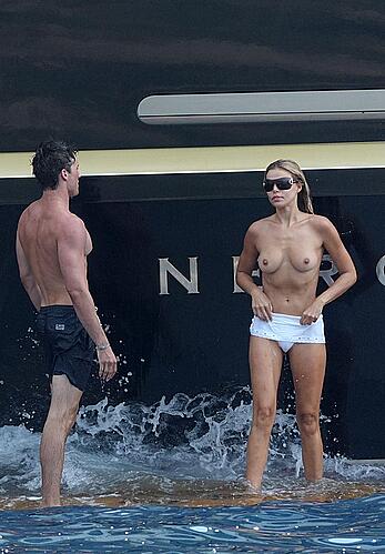 Brooks Nader topless on a yacht in Positano, Italy - August 27, 2026