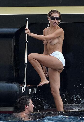 Brooks Nader topless on a yacht in Positano, Italy - August 27, 2026