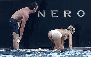 Brooks Nader topless on a yacht in Positano, Italy - August 27, 2026