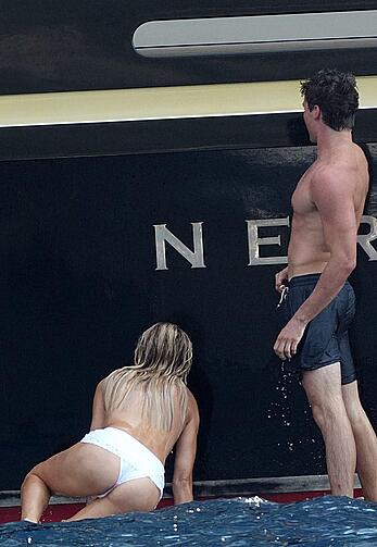 Brooks Nader topless on a yacht in Positano, Italy - August 27, 2026