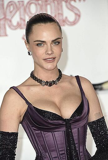 Cara Delevingne cleavage at the Wuthering Heights Premiere in LA