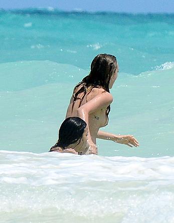 Cara Delevingne topless and Michelle Rodriguez in bikini on a Beach in Mexico