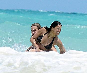 Cara Delevingne topless and Michelle Rodriguez in bikini on a Beach in Mexico