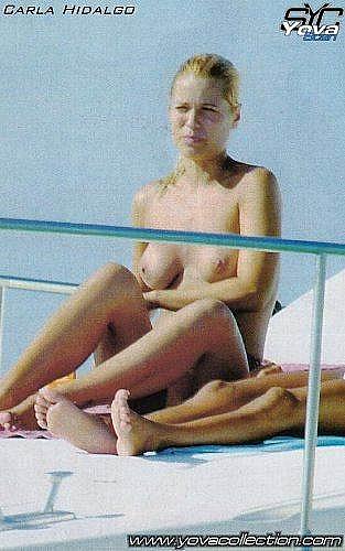Carla Hidalgo sunbathing topless on a yacht