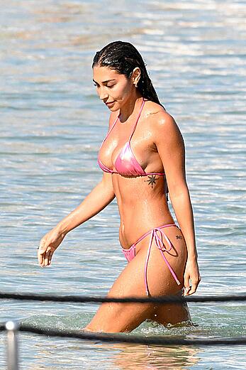 Chantel Jeffries in tiny pink bikini hits the beach in Mykonos - August 14, 2026