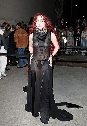 Chappell Roan braless in sheer dress at McQueen Womenswear Fall-Winter 2026-2027 show