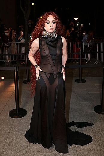 Chappell Roan braless in sheer dress at McQueen Womenswear Fall-Winter 2026-2027 show