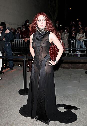 Chappell Roan braless in sheer dress at McQueen Womenswear Fall-Winter 2026-2027 show