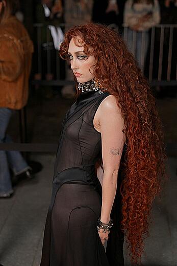 Chappell Roan braless in sheer dress at McQueen Womenswear Fall-Winter 2026-2027 show