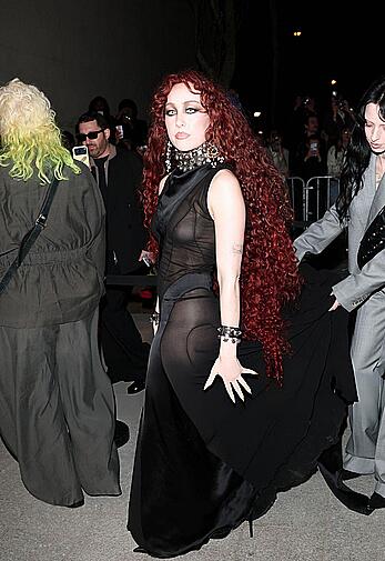 Chappell Roan braless in sheer dress at McQueen Womenswear Fall-Winter 2026-2027 show
