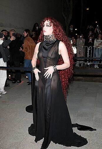 Chappell Roan braless in sheer dress at McQueen Womenswear Fall-Winter 2026-2027 show