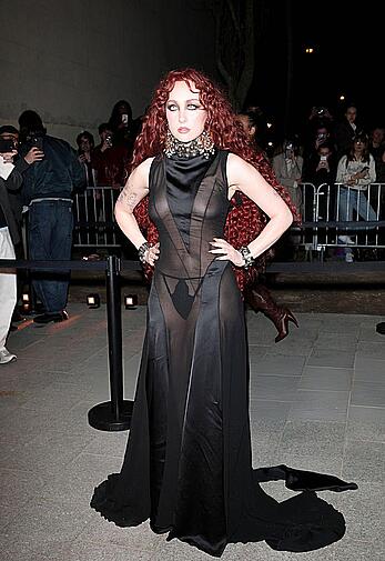 Chappell Roan braless in sheer dress at McQueen Womenswear Fall-Winter 2026-2027 show