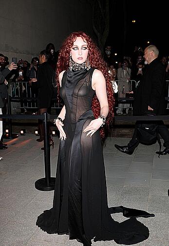 Chappell Roan braless in sheer dress at McQueen Womenswear Fall-Winter 2026-2027 show