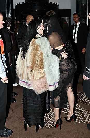 Charli XCX braless in sheer dress arrives at the Warner Music Brit Awards after party at Claridges Hotel in London