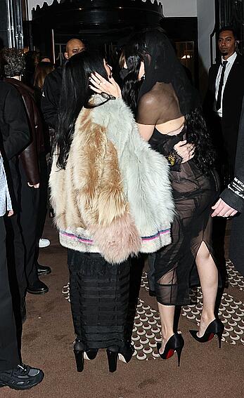 Charli XCX braless in sheer dress arrives at the Warner Music Brit Awards after party at Claridges Hotel in London