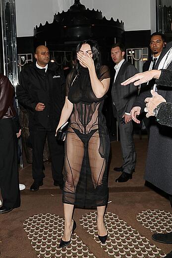 Charli XCX braless in sheer dress arrives at the Warner Music Brit Awards after party at Claridges Hotel in London