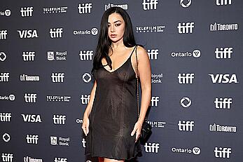 Charli XCX braless in see through mini dress at Erupcja premiere in Toronto
