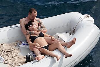 Charli XCX topless on a boat in vacation on the Amalfi Coast