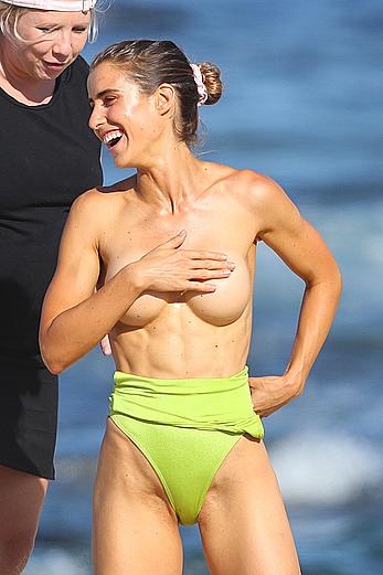 Claudia Jovanovski topless for a photoshoot on a beach in Sydney