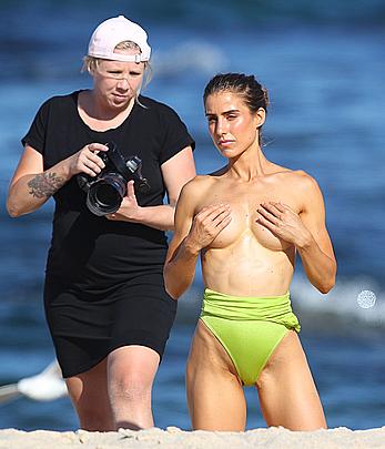 Claudia Jovanovski topless for a photoshoot on a beach in Sydney