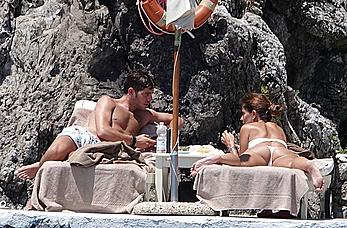 Coral Simanovich in white bikini and topless