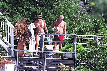 Daisy Fuentes topless on her hotel balcony