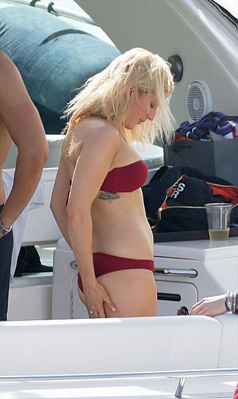 Ellie Goulding in bikini on a yacht in Miami