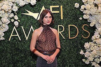 Emilia Jones braless in see through blouse at AFI Awards in Beverly Hills