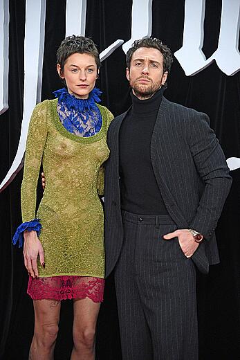 Emma Corrin brales in see through dress at Nosferatu World premiere in Berlin