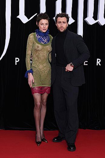 Emma Corrin brales in see through dress at Nosferatu World premiere in Berlin