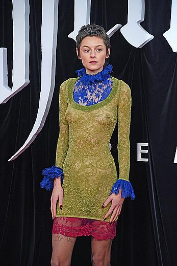 Emma Corrin brales in see through dress at Nosferatu World premiere in Berlin