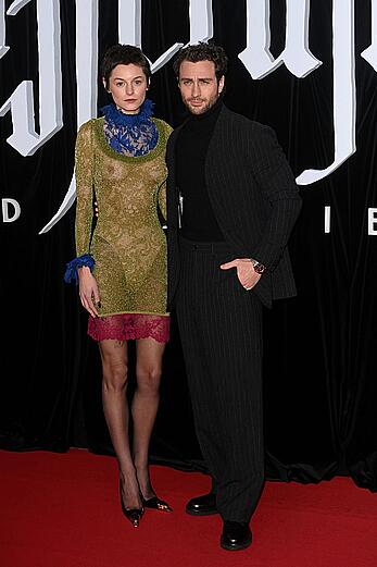 Emma Corrin brales in see through dress at Nosferatu World premiere in Berlin