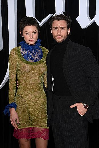 Emma Corrin brales in see through dress at Nosferatu World premiere in Berlin