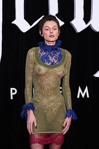 Emma Corrin brales in see through dress at Nosferatu World premiere in Berlin