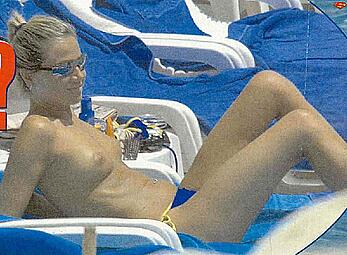 Federica Panicucci topless on a beach paparazzi shots