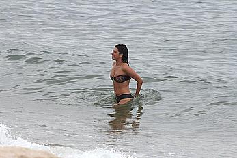 Fernanda Paes Leme touch her boobs in bikini on the beach