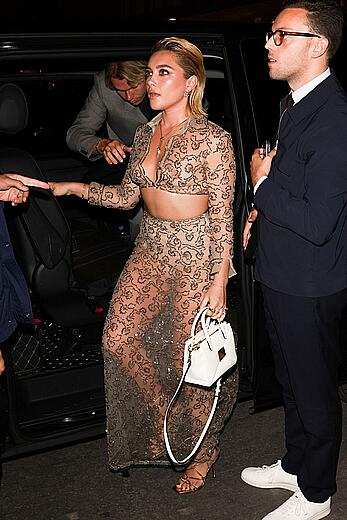 Florence Pugh braless in see through dress at the Valentino Dinner in Paris