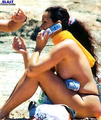 Gabriella Labate topless on a beach paparazzi photos