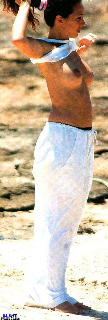 Gabriella Labate topless on a beach paparazzi photos