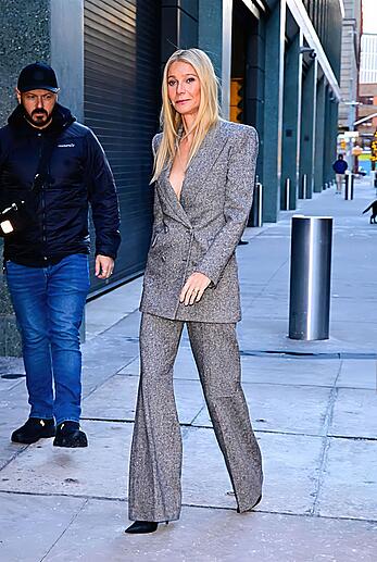 Gwyneth Paltrow braless arriving at GMA - December 15, 2025
