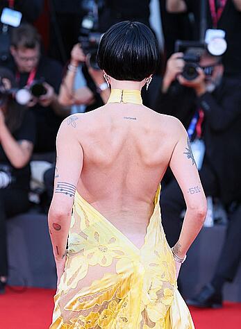 Halsey braless in yellow see through dress at The Smashing Machine red carpet in Venice
