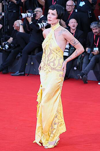 Halsey braless in yellow see through dress at The Smashing Machine red carpet in Venice