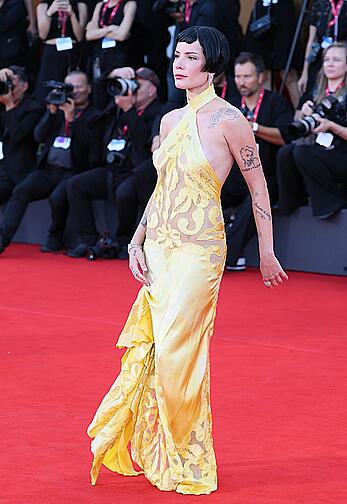 Halsey braless in yellow see through dress at The Smashing Machine red carpet in Venice