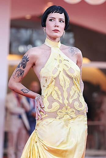 Halsey braless in yellow see through dress at The Smashing Machine red carpet in Venice