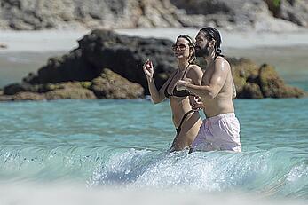 Heidi Klum in bikini and topless on the beach in St. Barths - December 12, 2025