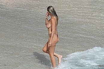 Heidi Klum topless at beach Getaway in St. Barts